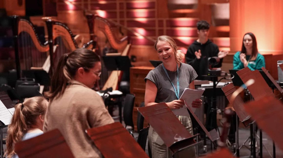 Composer Dani Howard in rehearsal with NYO