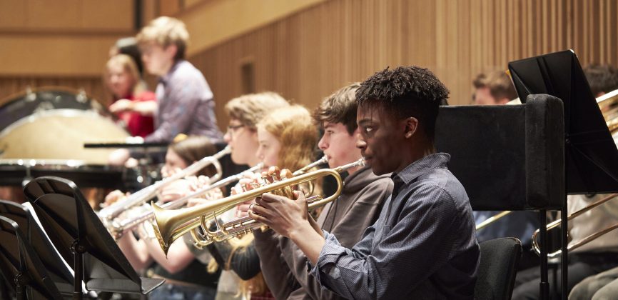 Michael playing trumpet at a rehearsal